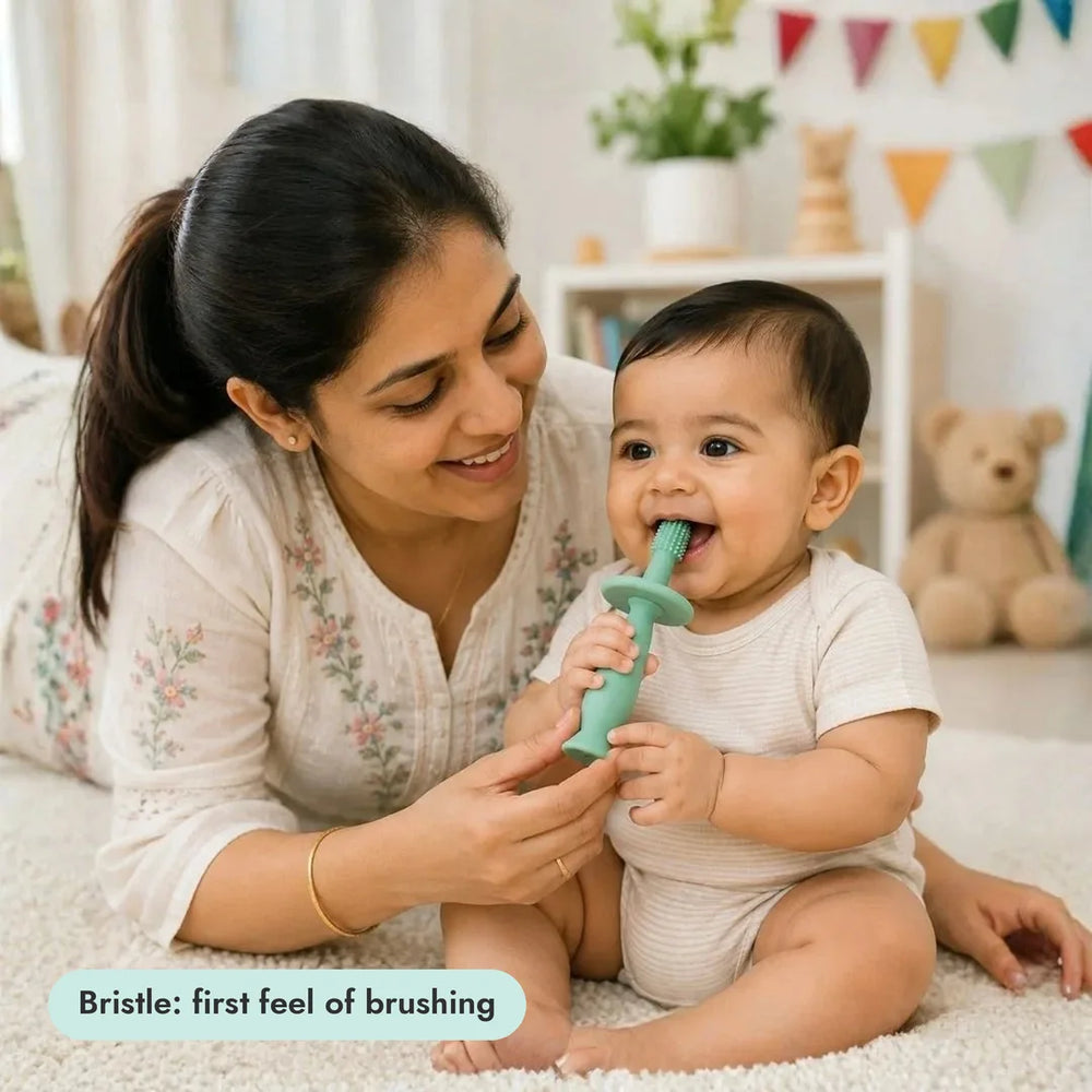 Baby with the Bristle Teether from the Gentle Start Trio
