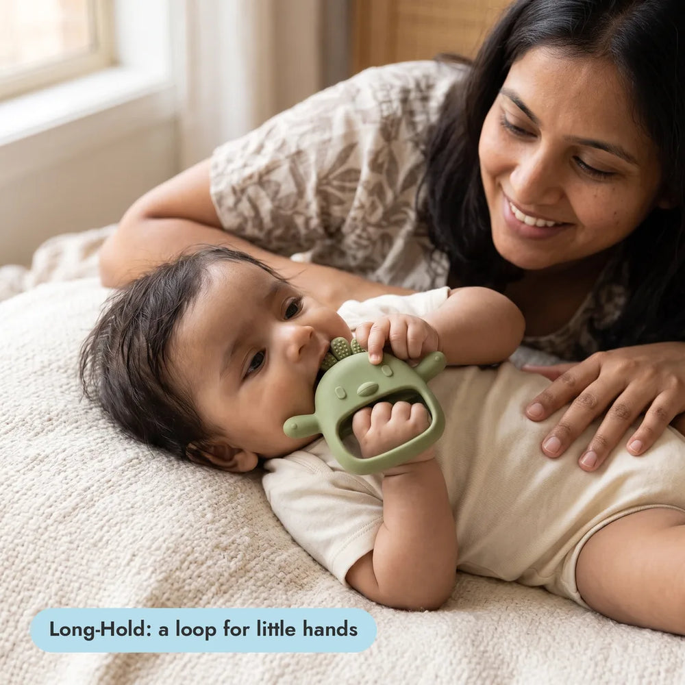 Baby with the Long-Hold Handle Teether from the Grip & Rattle Pair