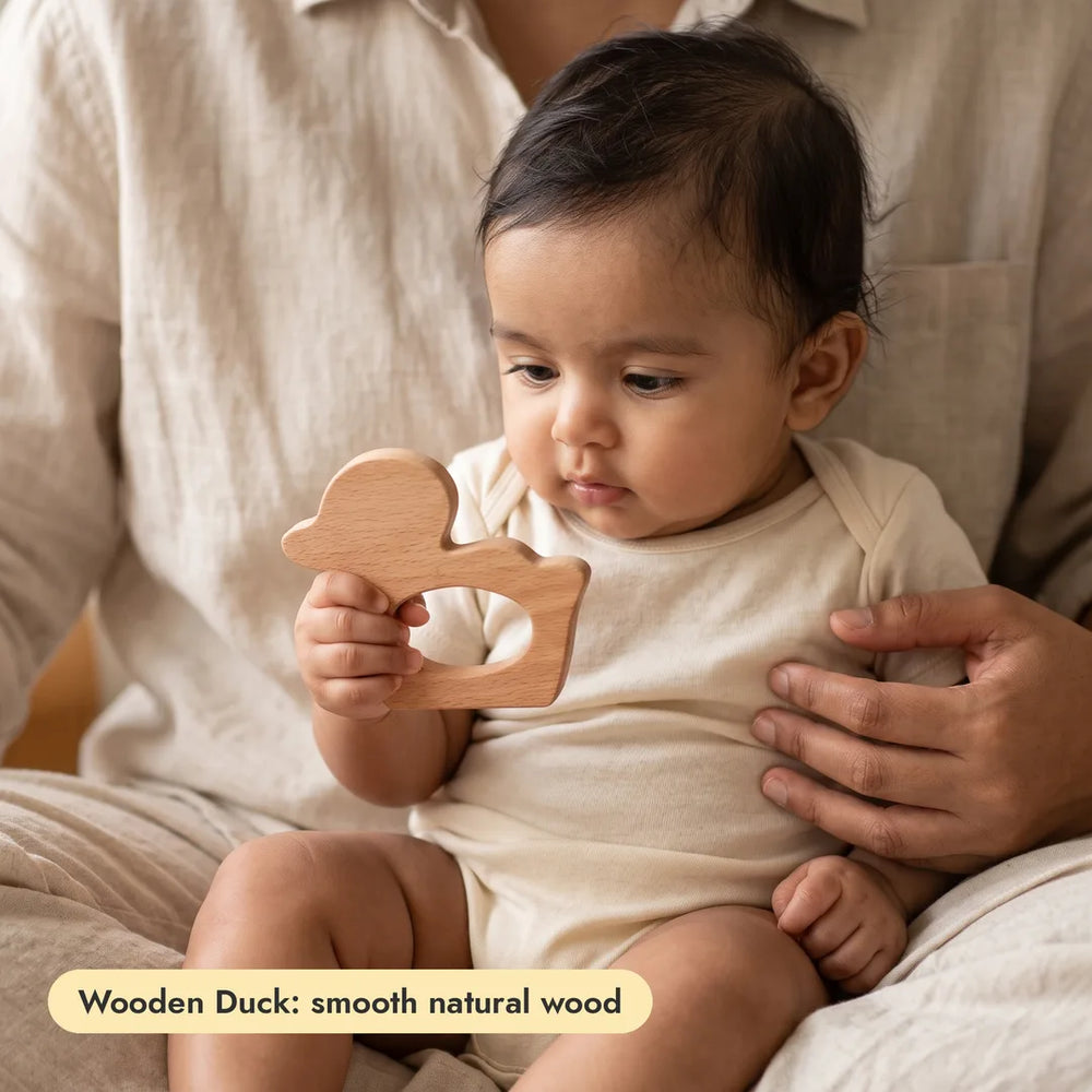 Baby with the Wooden Duck Teether from the Long-Hold Twin Pack + Wooden